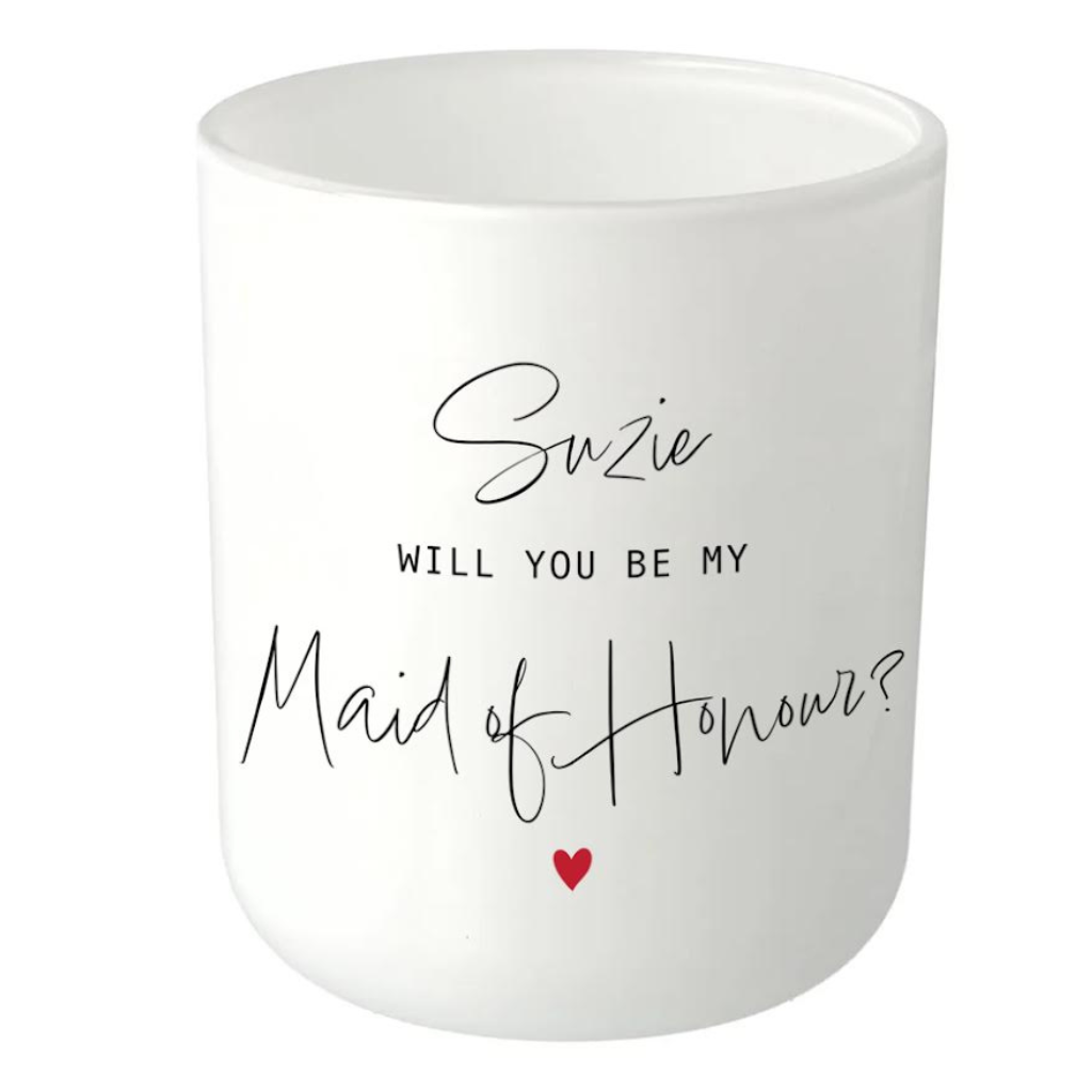 This candle exudes elegance with its sleek black and white design, featuring a graceful Will You Be My Bridesmaid imprint on the glass. Our soy wax candle glassware captures the timeless charm of the Oxford, while its curved base adds a touch of modern sophistication - add a name for personalisation.
