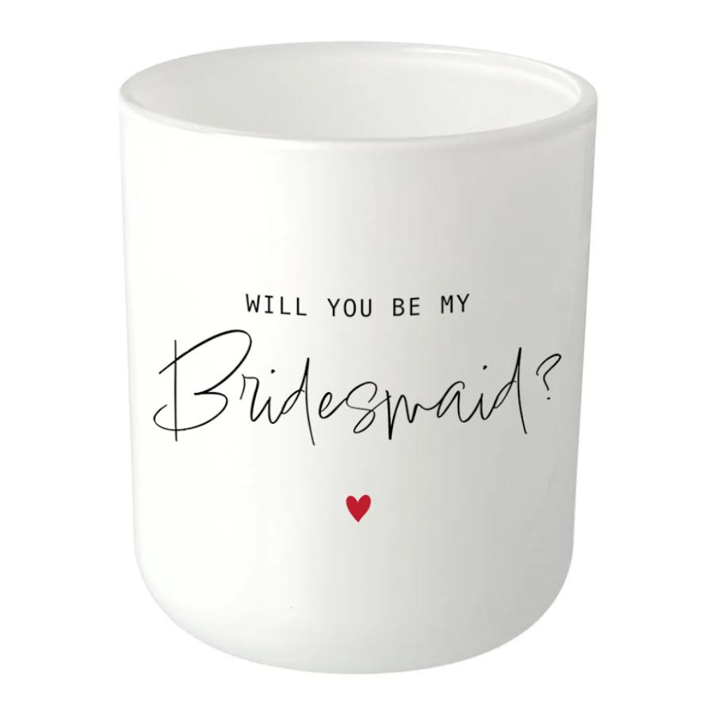This candle exudes elegance with its sleek black and white design, featuring a graceful Will You Be My Bridesmaid imprint on the glass. Our soy wax candle glassware captures the timeless charm of the Oxford, while its curved base adds a touch of modern sophistication.