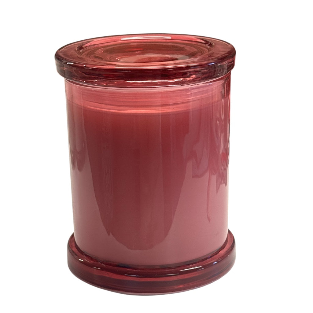 Pink vessel  candle in a glass jar. 