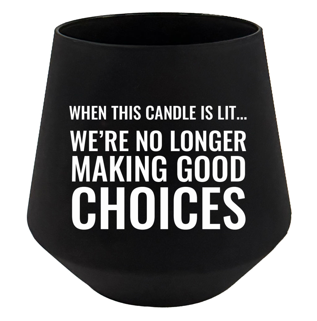 Black candle holder with humorous text on a white background